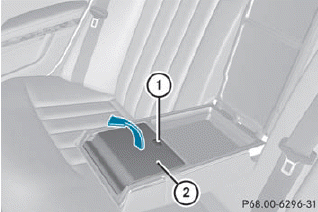 ► Fold down the rear seat armrest.