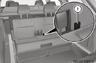 ► Pull the seat cushion upwards by tab 1