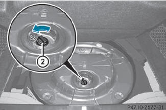 Turn DEF filler cap 2 counter-clockwise